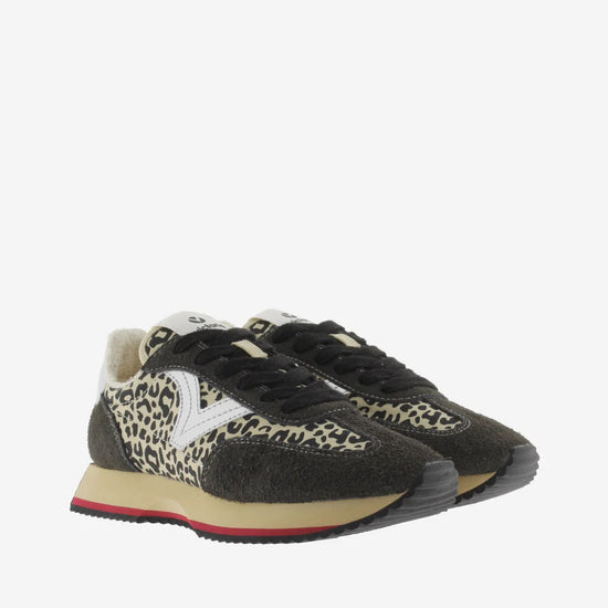 black trainers with silver v, animal print and black laces with fleece interior front view