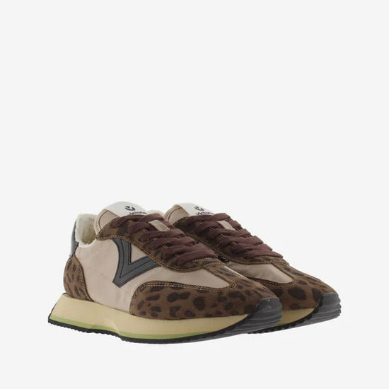 chocolate brown trainers with fleece interior, leopard print, black v and brown laces  front view