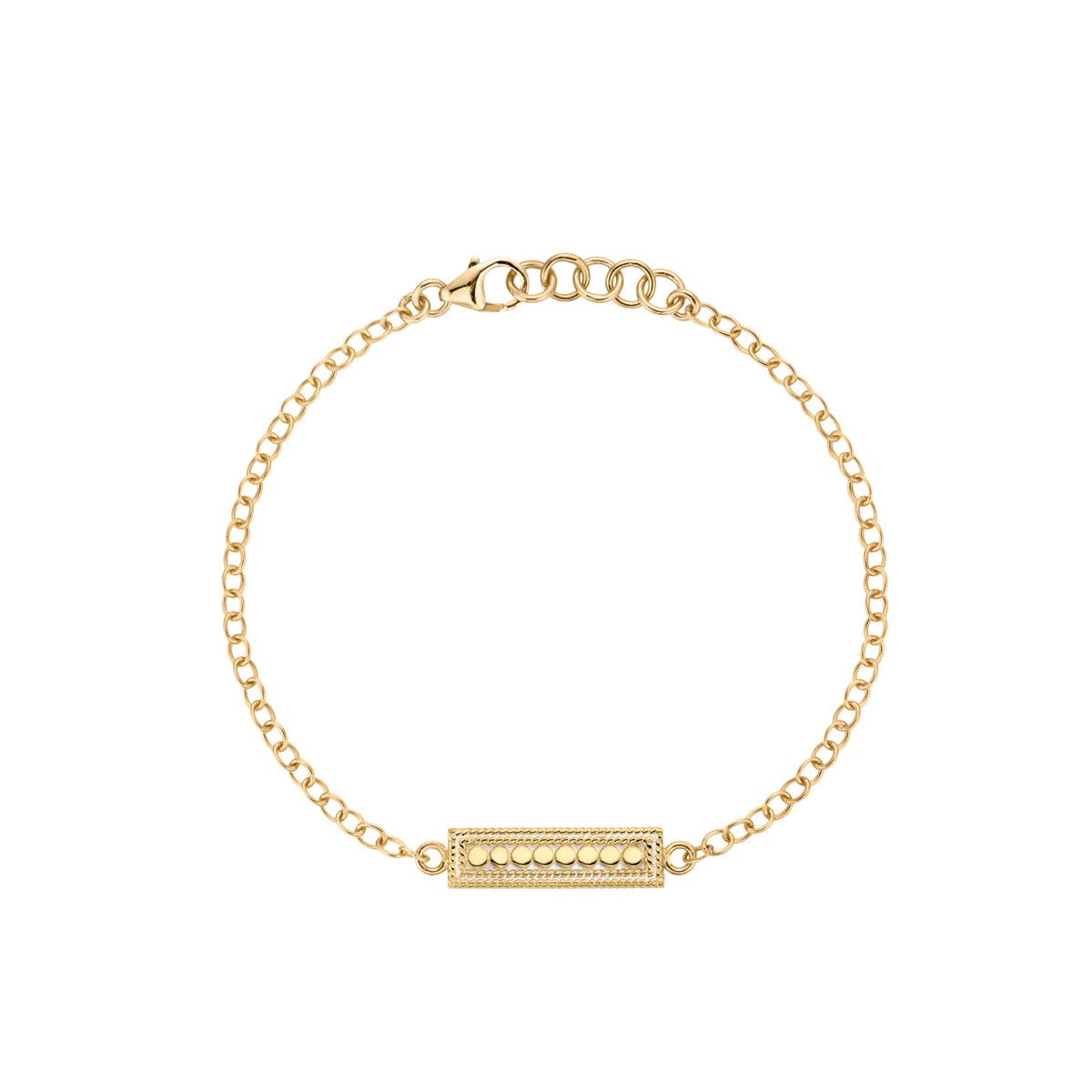 Gold bracelet with a bar charm on a white background from Anna Beck