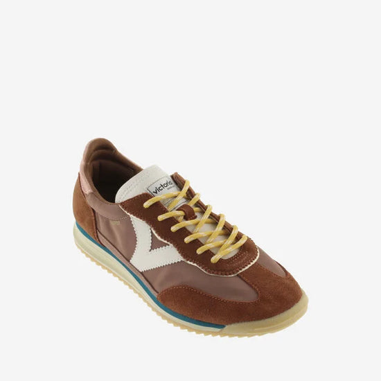 terracotta coloured suede trainers with cyclist toe and serrated tread 