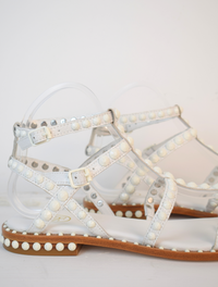 White studded gladiator sandals with tan sole