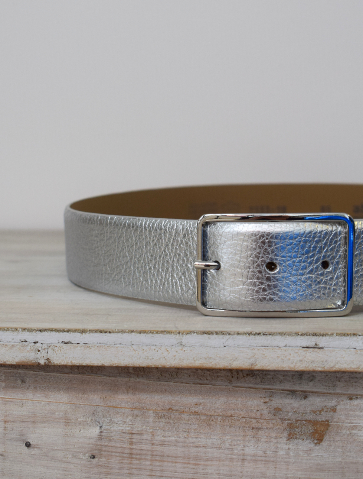 Silver belt with thin silver buckle