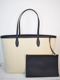 Natural fabric shopper with navy leather trim and internal zippable pouch pocket detail