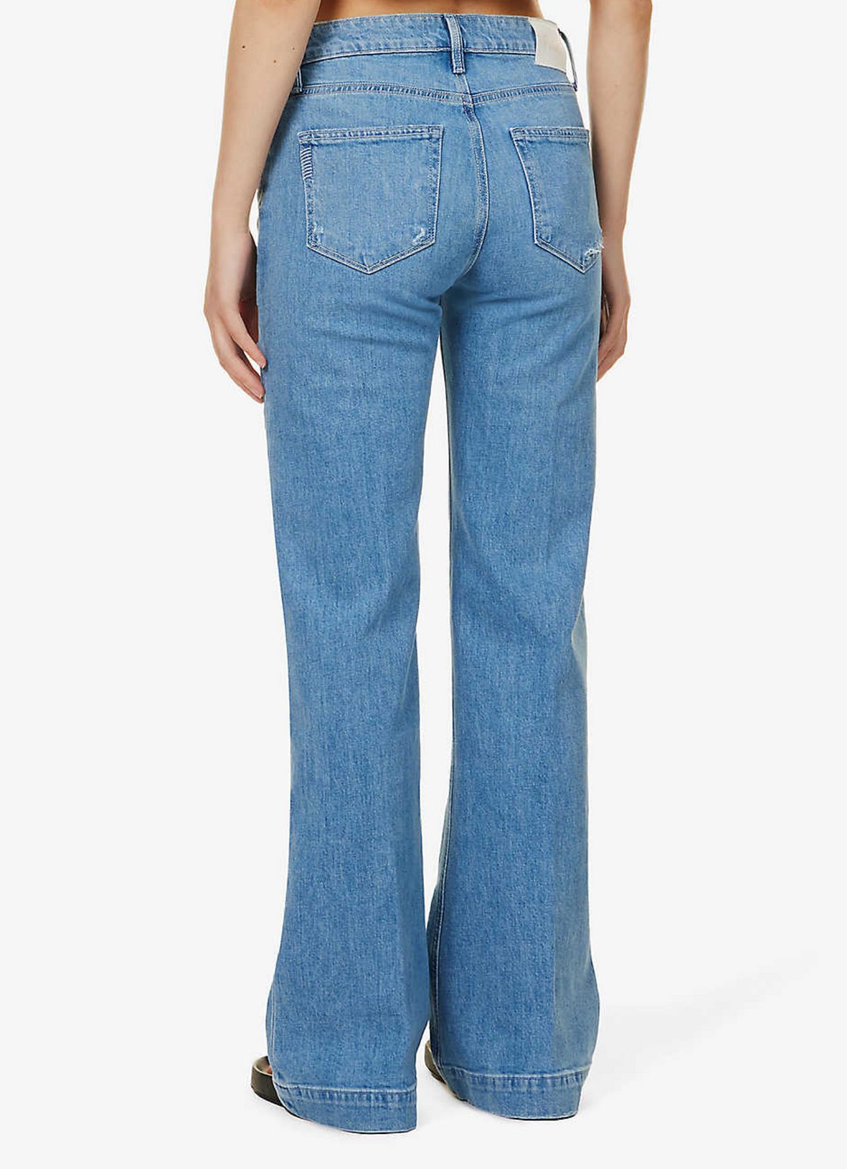 Wide leg light wash jeans with button fly