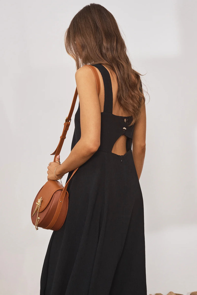 Black crinkle effect midi dress with straps cut out at the back and bow front with empire line