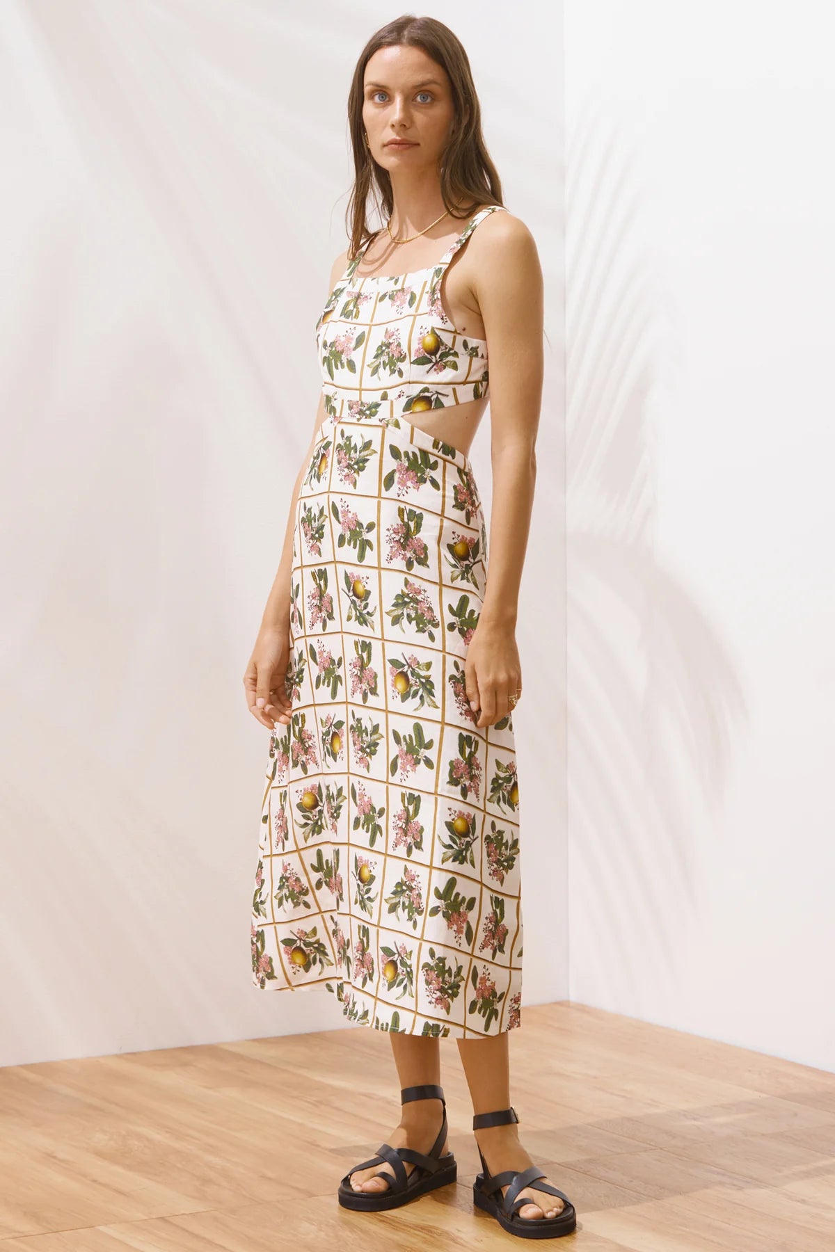 Sleeveless botanical inspired printed midi dress with side and back cut outs and square neckline