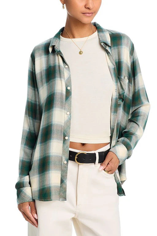 Plaid shirt worn open buy model over a white tee