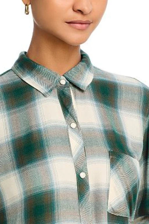 close up of paid shirt with push stud fastening