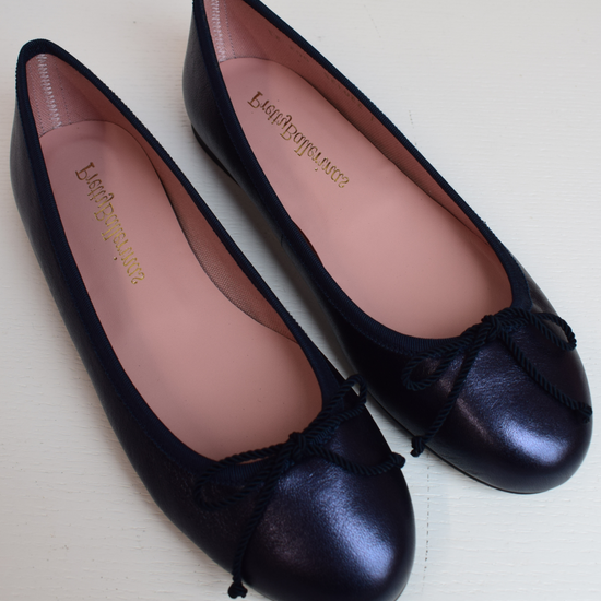 Shimmer navy blue classic round toe ballet pumps with navy thin ribbed binding and navy thin rope bow on toe