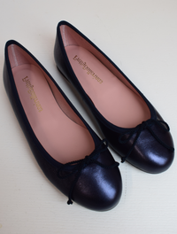 Shimmer navy blue classic round toe ballet pumps with navy thin ribbed binding and navy thin rope bow on toe
