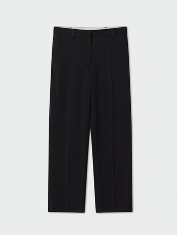 Black tapered tailored flat fronted trousers with side pockets and centre creases