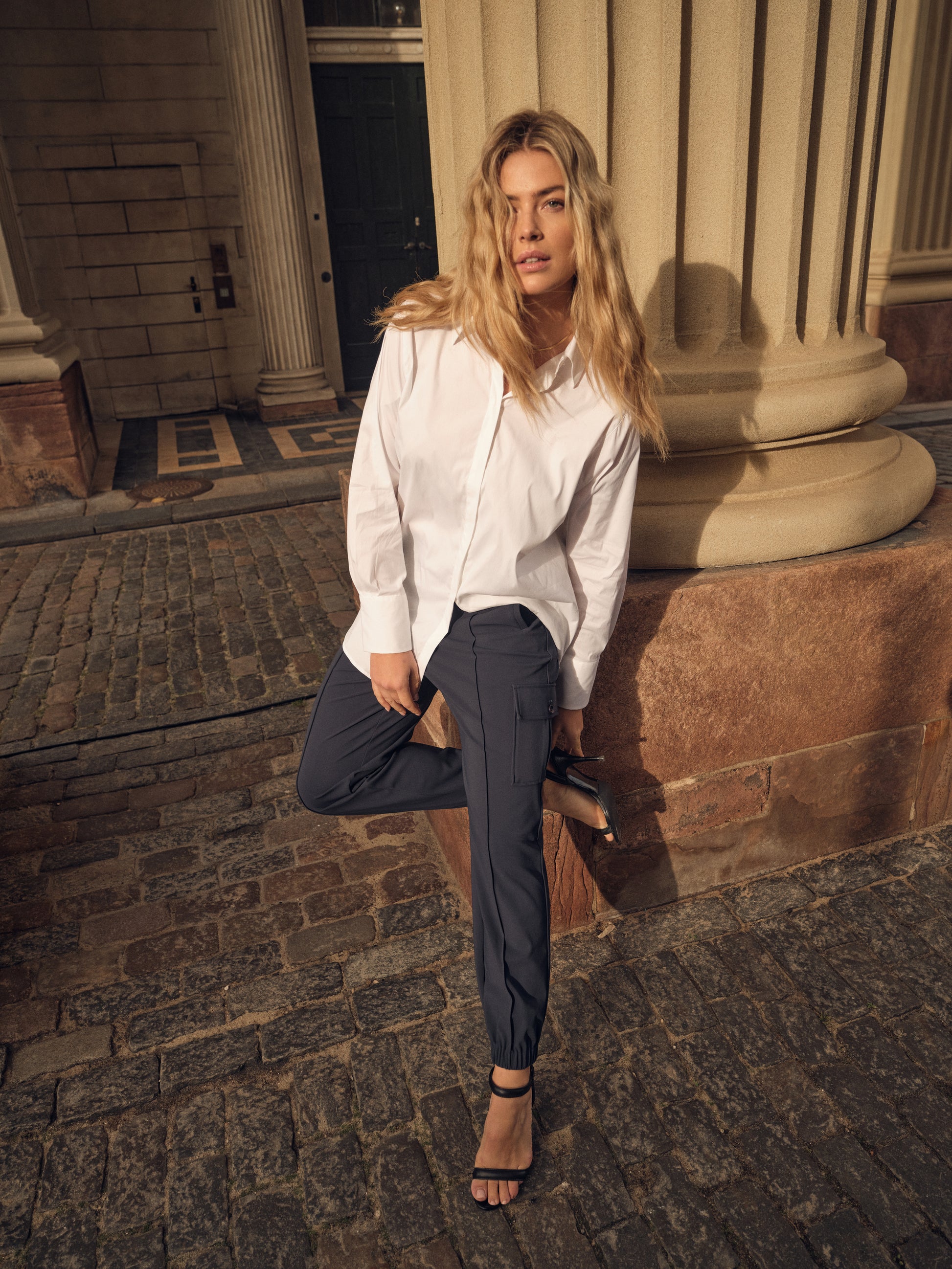 white shirt with concealed placket, curved hem and classic collar  model shot 