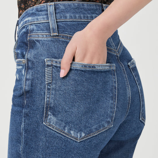 Medium blue high waist jeans with flared bottom rear pocket