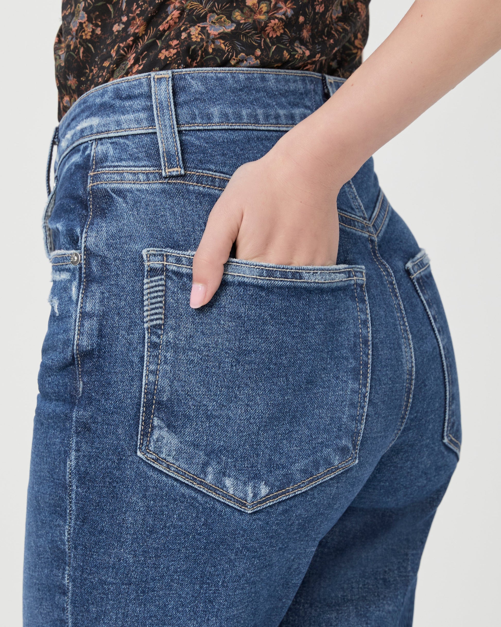 Medium blue high waist jeans with flared bottom rear pocket