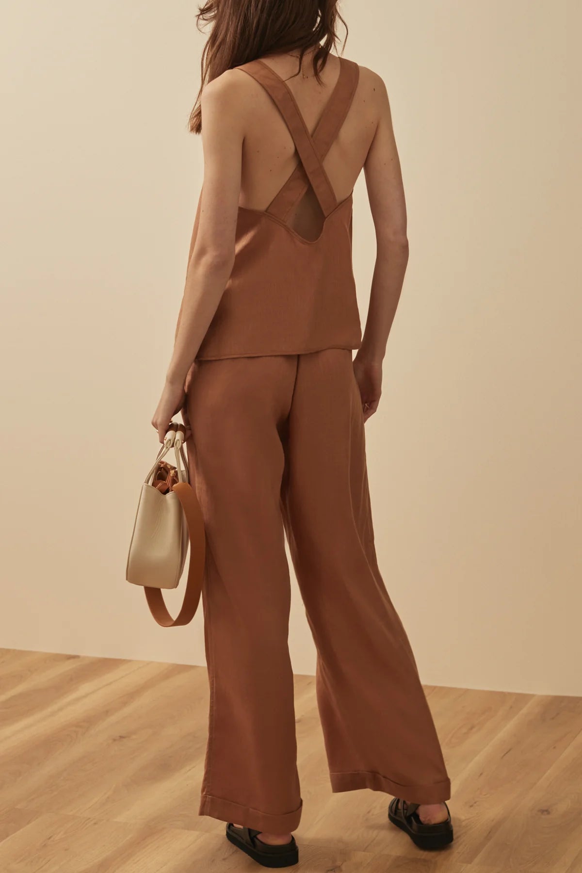 Brown wide leg trousers rear view