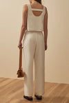 White linen trousers with patch pockets and top stitching rear view