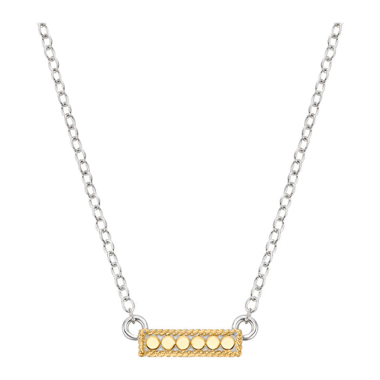 Necklace with a gold bar pendant on a white background