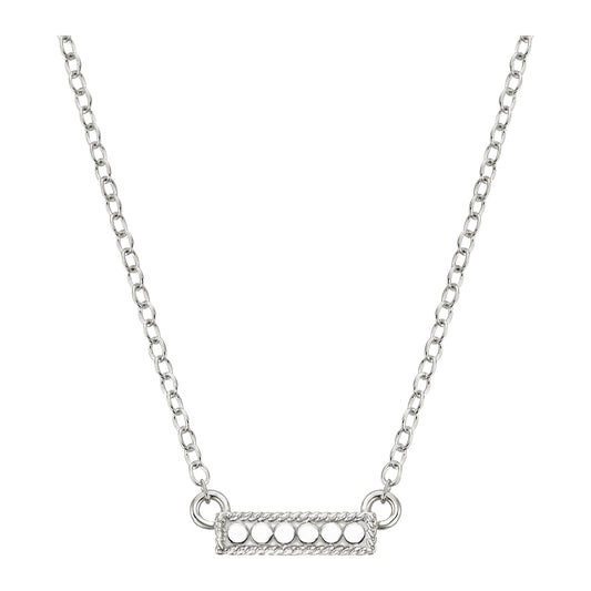 Silver necklace with a bar pendant on a white background