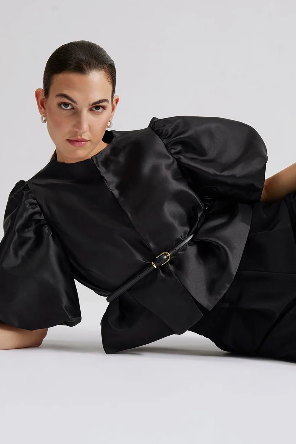 Edge to edge satin jacket in black with puff short sleeves