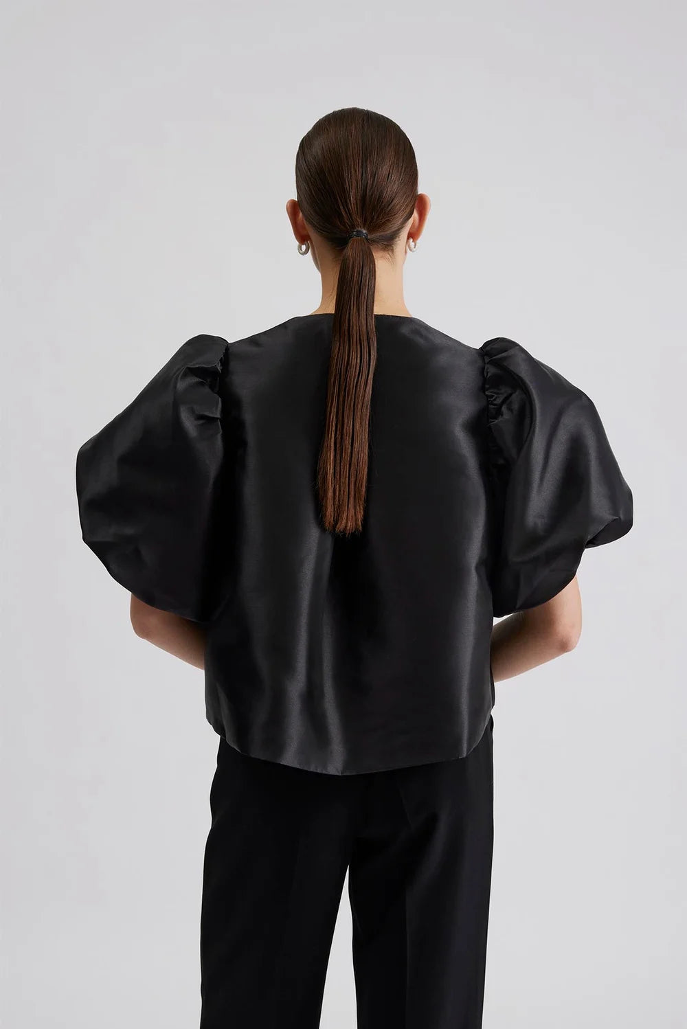 Edge to edge satin jacket in black with puff short sleeves