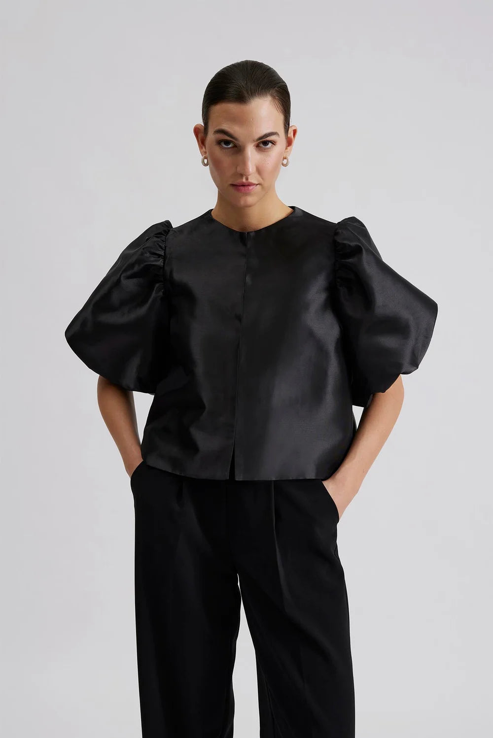 Edge to edge satin jacket in black with puff short sleeves