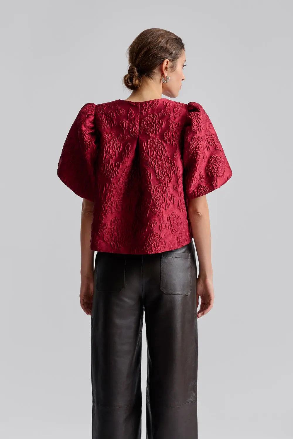 red puff sleeve top with hook eye fastening rear view 