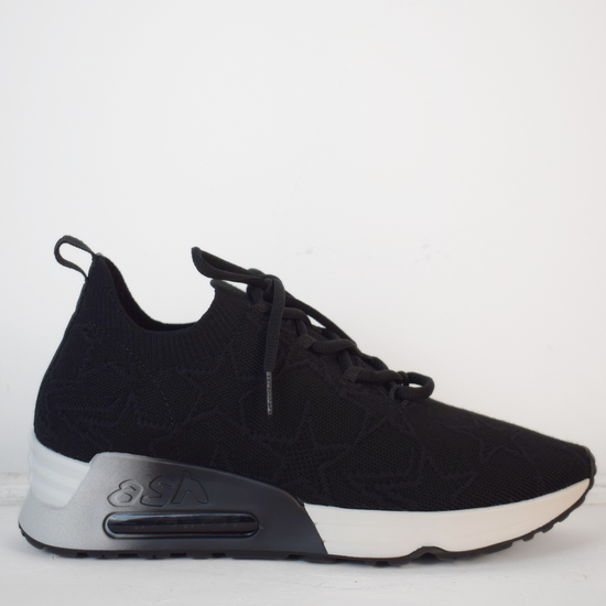 Black textile trainer with star design black laces and a white sole with air bubble