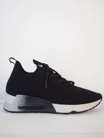 Black textile trainer with star design black laces and a white sole with air bubble