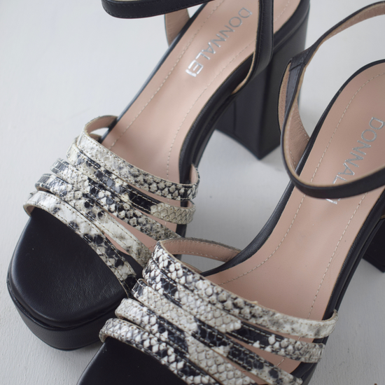 Black platform heel with snake skin straps 