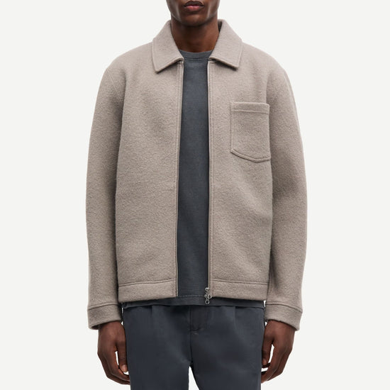 light grey/beige wool mens zip jacket with chest pocket and point collar model shot