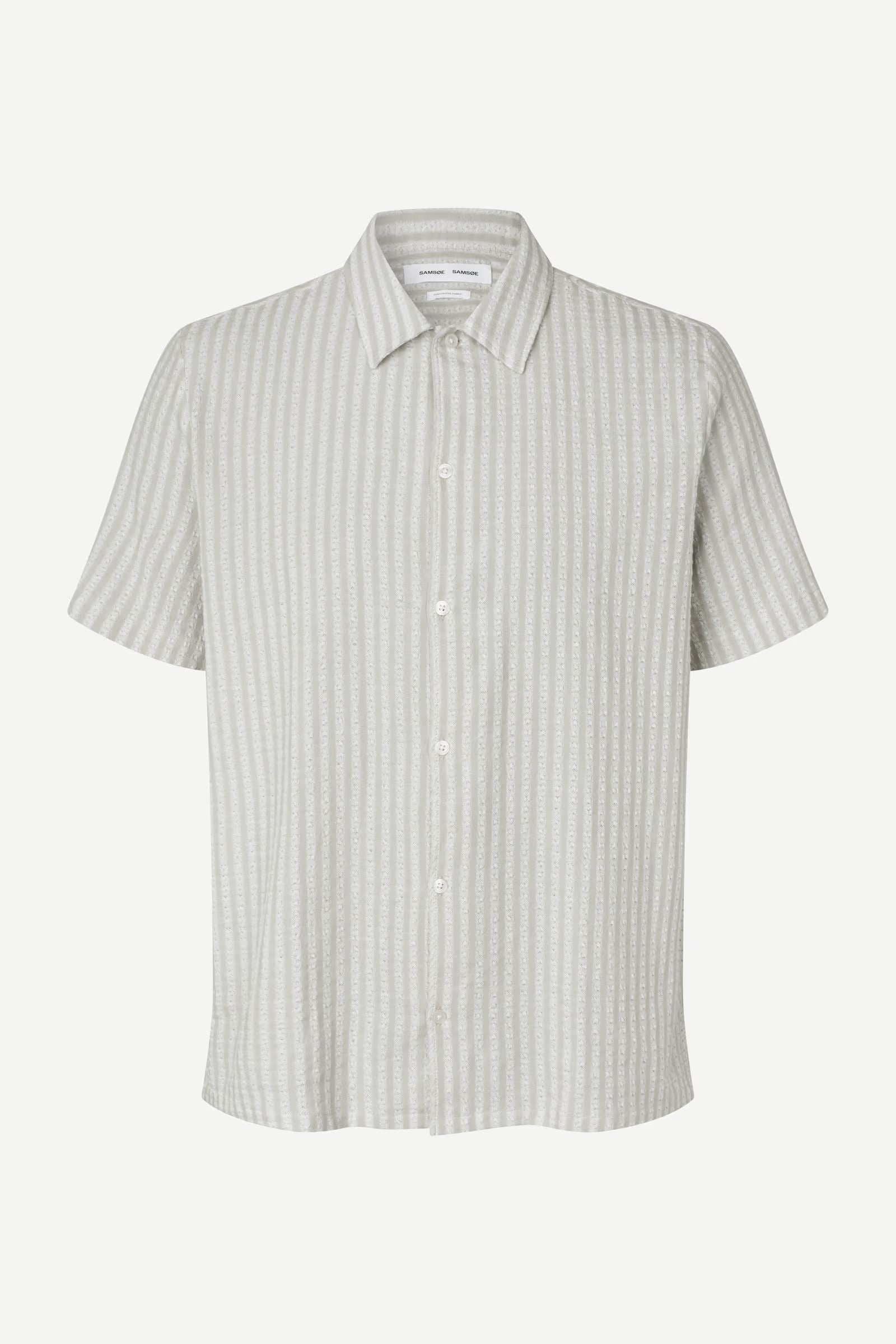 Short-sleeve shirt with a subtle pattern on a white background