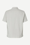 Short-sleeve shirt with a subtle pattern on a white background