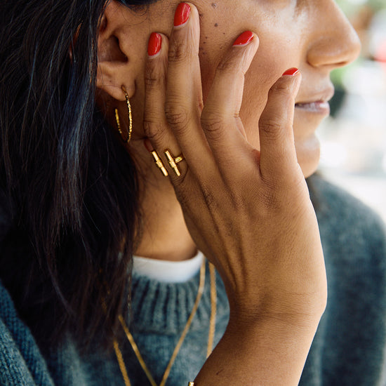 gold adjustable t bar ring from rachel jackson model shot