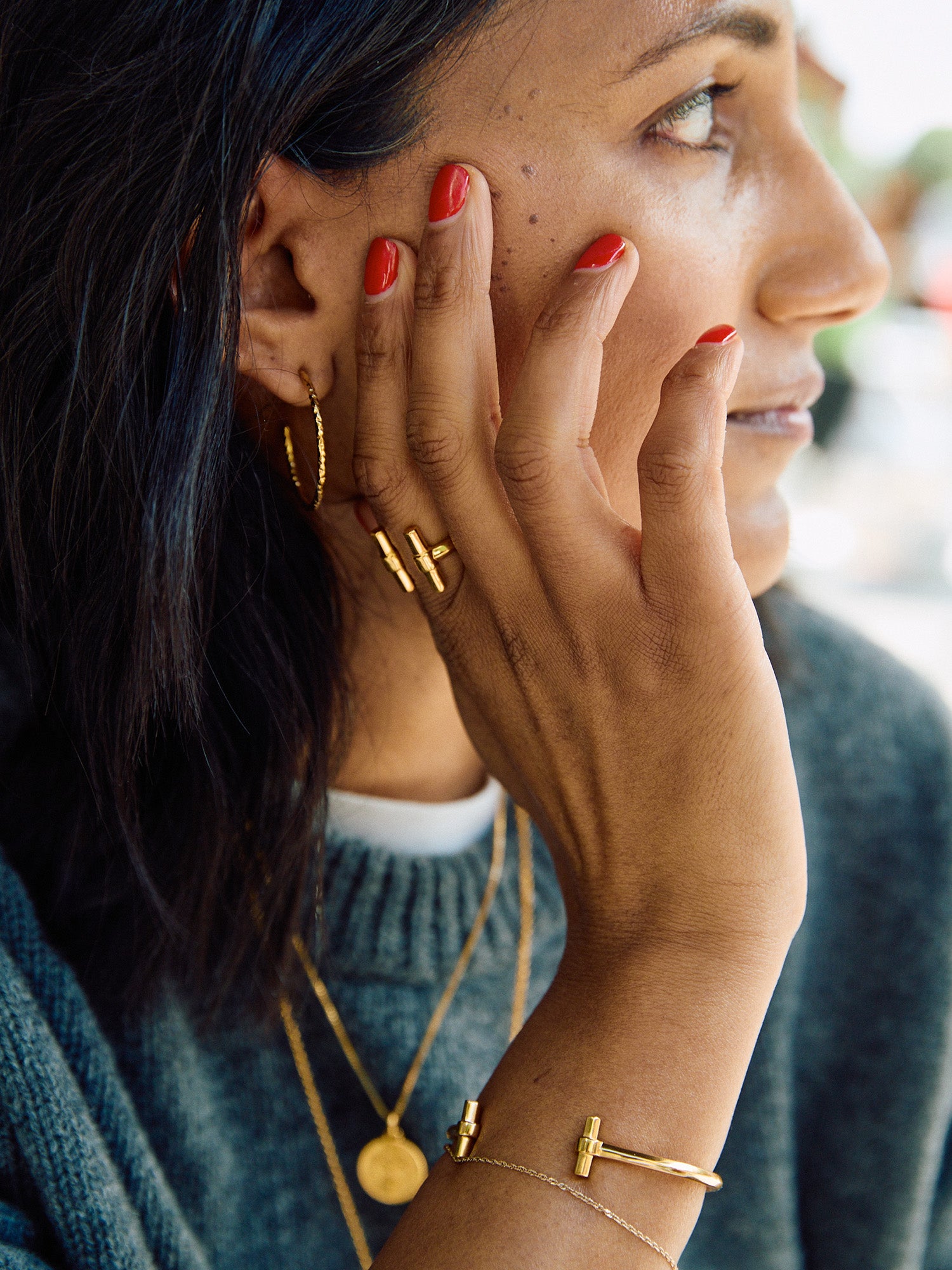 gold adjustable t bar ring from rachel jackson model shot
