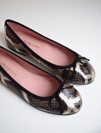 Mock snake leather ballet pumps with black bow on toe with gold shimmer detail