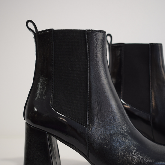 Pull on black patent boot with a block heel