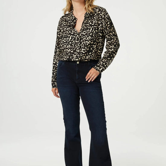 Classic shirt with full length covered placket in a black and ecru animal print