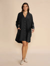 V neck knee length linen shirt dress with long sleeves and curved dropped hem