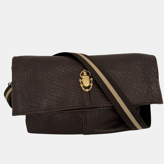 brown lamb leather fold over bag with adjustable strap and gold scarab detail with strap