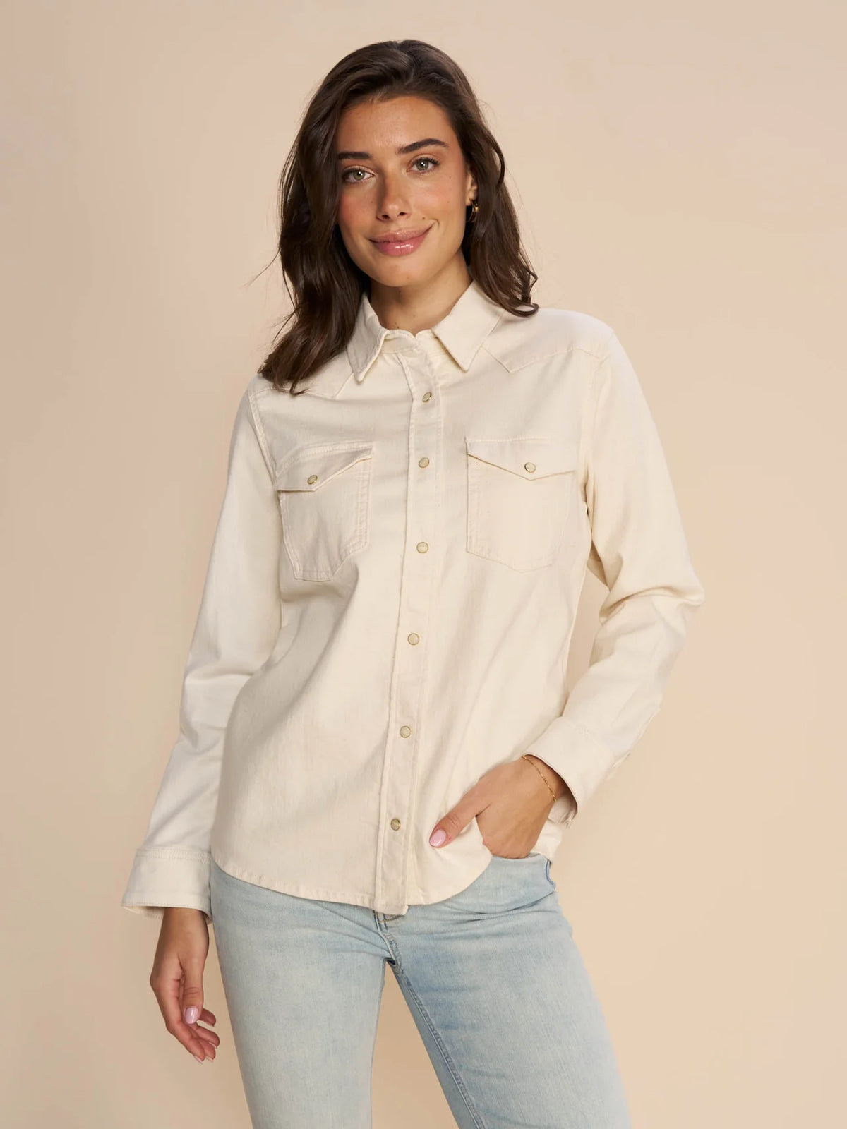 Ecru heavy weight shirt with two front patch pockets and popper stud fastenings