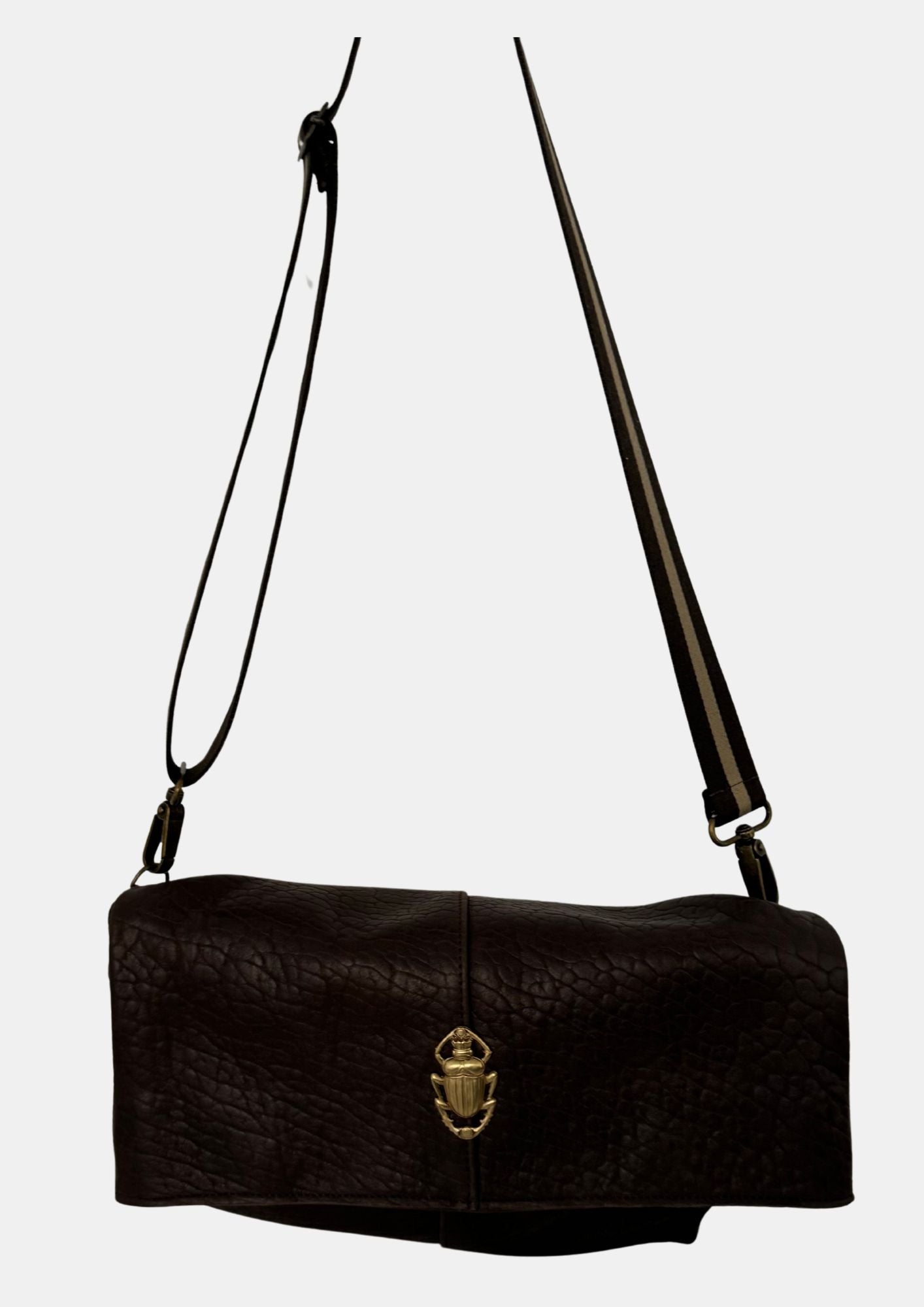 brown lamb leather fold over bag with adjustable strap and gold scarab detail