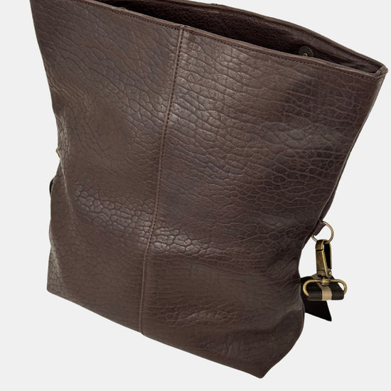 brown lamb leather fold over bag with adjustable strap and gold scarab detail 