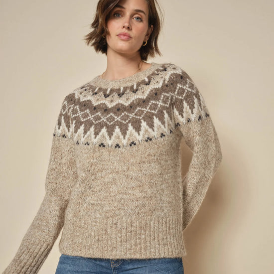 Oat brown alpaca blend knit on model with blue jeans