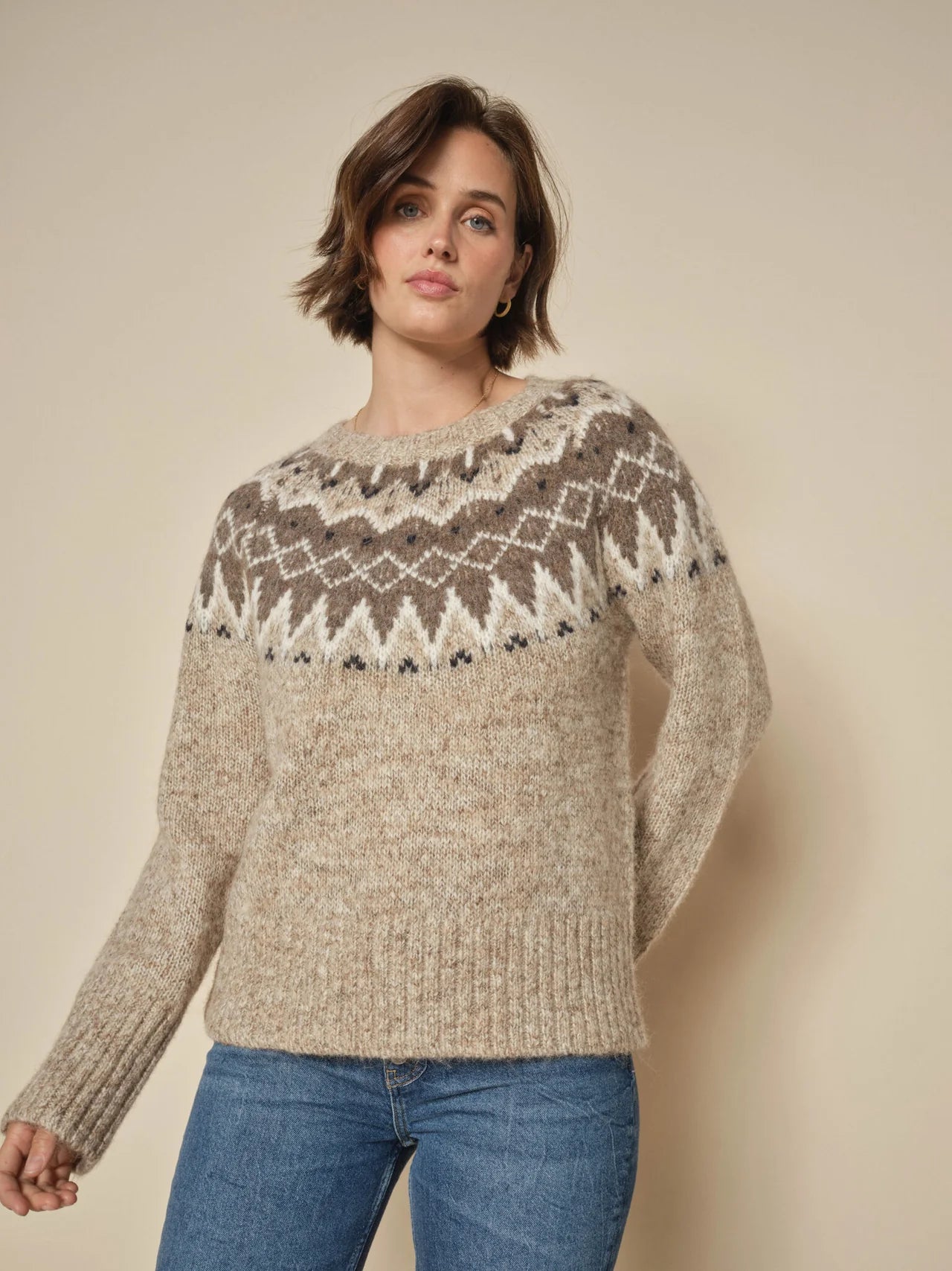 Oat brown alpaca blend knit on model with blue jeans