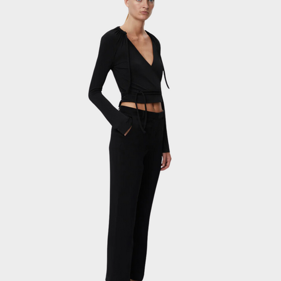 Black tapered tailored flat fronted trousers with side pockets and centre creases