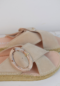 Pale beige slider with buckle detail and raffia sole 