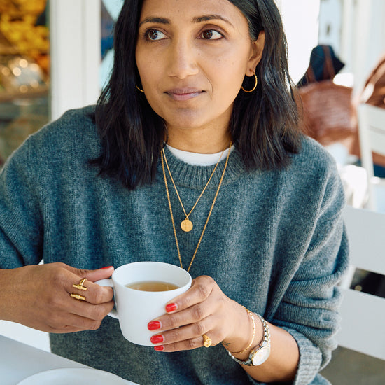 gold adjustable t bar ring from rachel jackson model shot