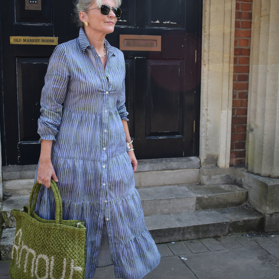 blue dress with green stripe detail 