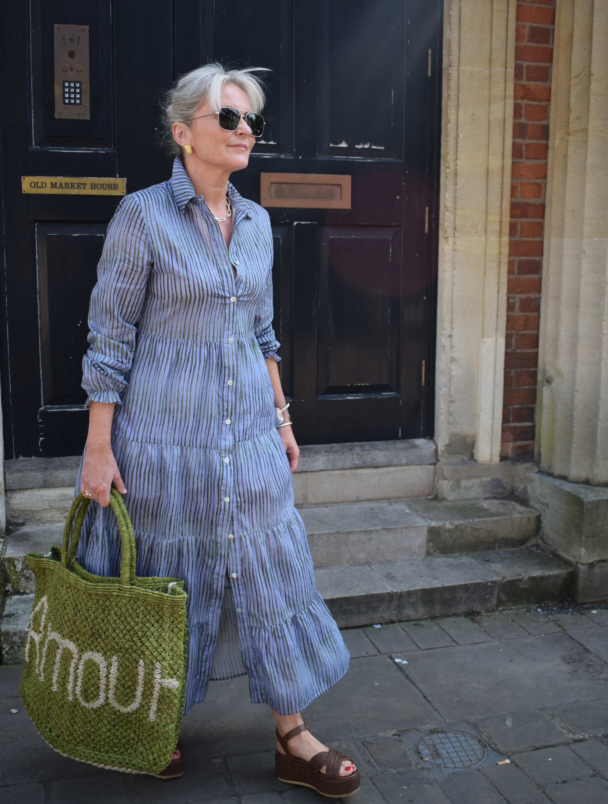 blue dress with green stripe detail 