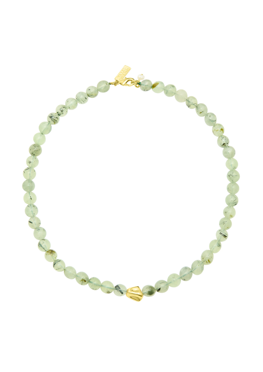 Necklace with green beads and gold accents on a white background from Talis Chains 